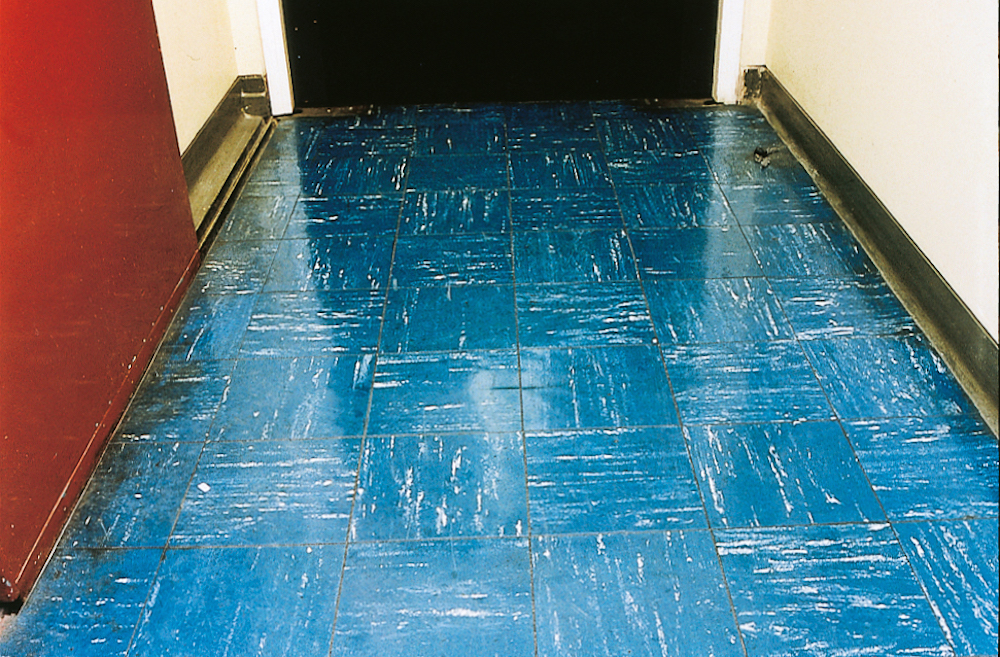 Vinyl floor tiles containing asbestos