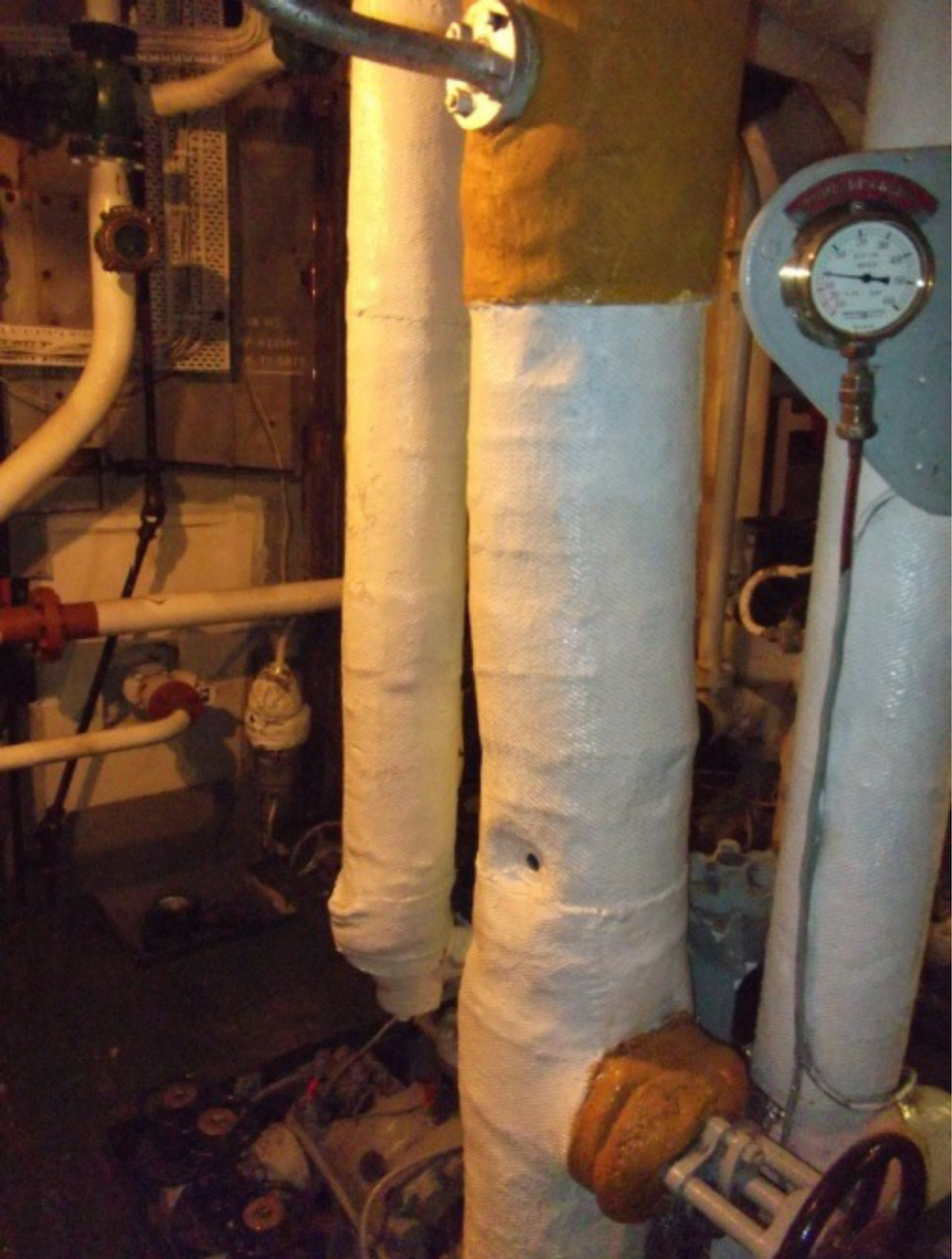 Asbestos insulation around pipework and boilers